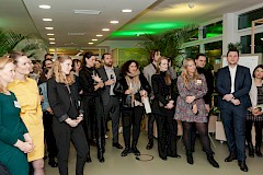 Guests listen intently to the opening speech